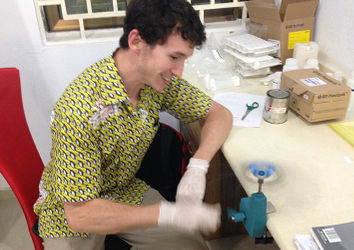 Spinning down blood samples using a manual centrifuge. Photo credit: Will Hamilton.